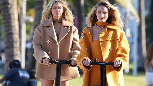 Candice Swanepoel And Kate Upton Show Off Their Long Legs As They Pose Up A Storm On Segways In High-fashion Rompers...
