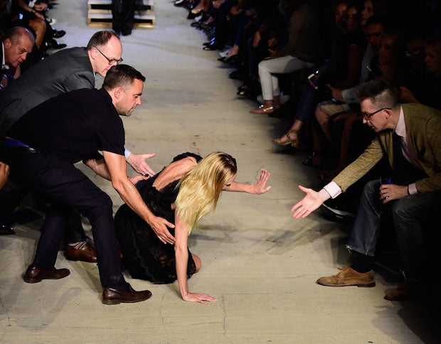 Candice Swanepoel Takes A Nasty Fall On The Fashion Week Runway!