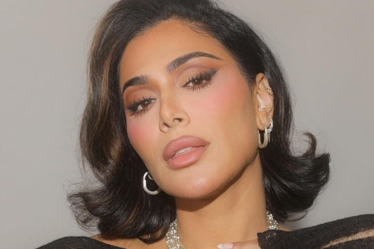 Uncovering The Relatable Struggles Behind Huda Kattan's Flawless Facade