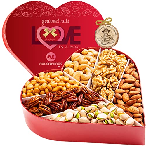 Heart-shaped gift basket filled with gourmet mixed nuts assortment collections.