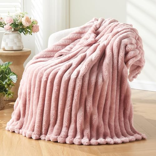 Cozy Pink Fleece Blanket for Snuggling and Warmth All Year.