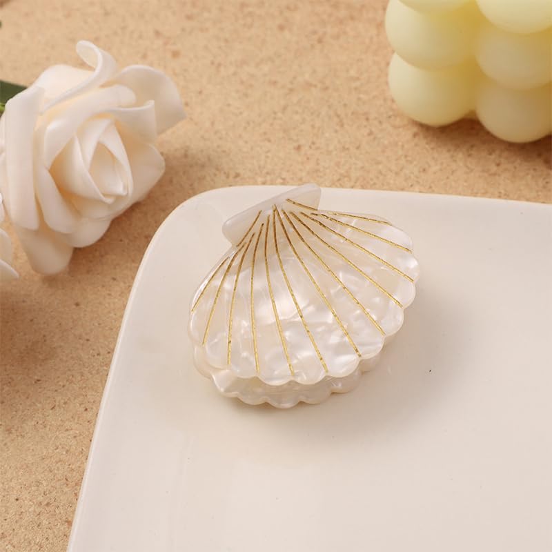 A Curious Little White Hair Clip with Shell Design Details
