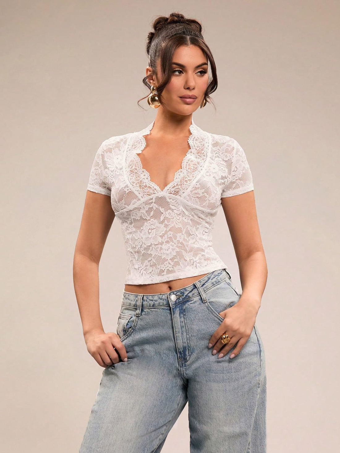 Women's Crop Top Description and Details Delicate floral lace sheer top with scalloped deep V neck.