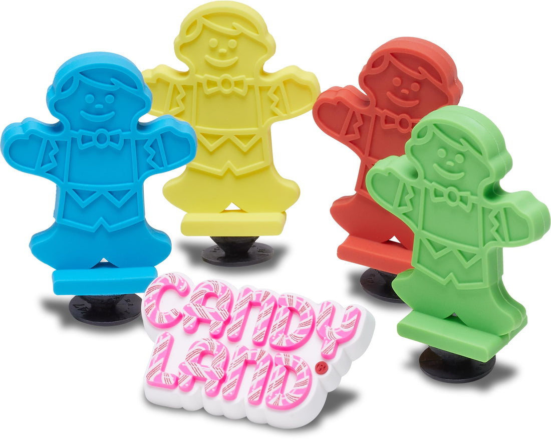 Colorful Crocs Jibbitz charms for kids' fun board game adventures.