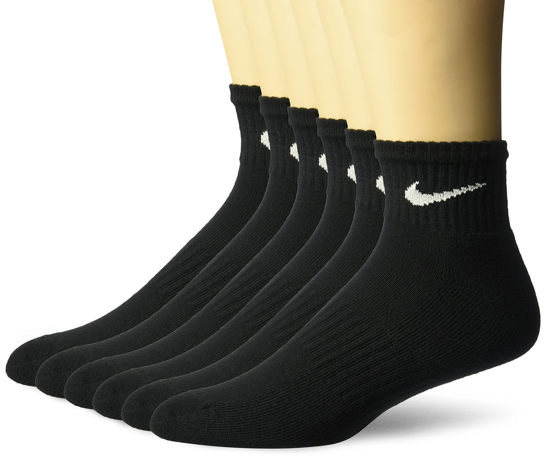 Moisture-wicking, cushioned, and ventilated quarter-length performance socks for exercise.