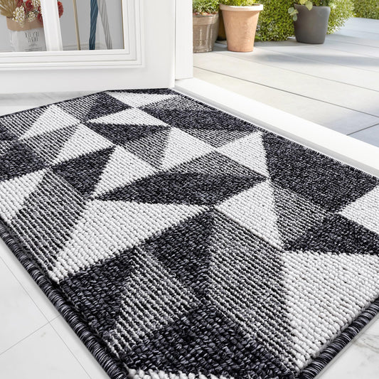 Geometric door mat with low profile, absorbent, and odor-free washable features.