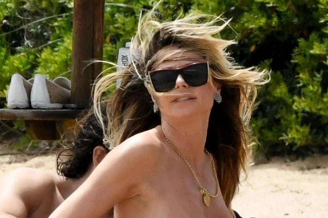 51, Stuns As She Goes Topless At The Beach On Holiday With Toyboy Husband